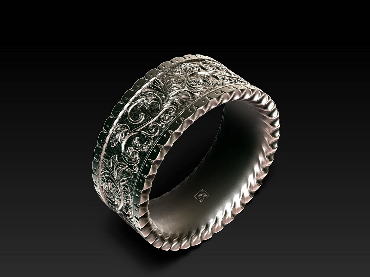 Polished Floral Ring showing sculptural floral relief, and raised border, smooth inner surface, and MF maker's mark
